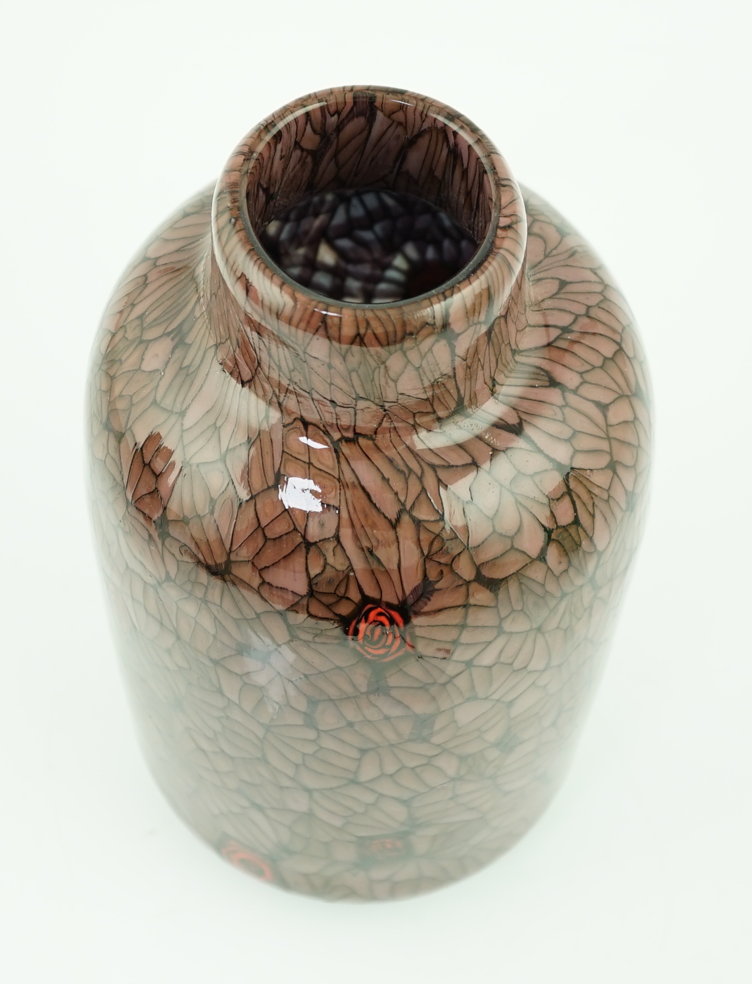 Vittorio Ferro (1932-2012) A Murano glass Murrine vase, the red brown ground with scattered red roses, unsigned, 27cm, Please note this lot attracts an additional import tax of 20% on the hammer price